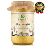 A jar of iOrganic A2 Desi Cow Ghee, made using the Ayurvedic bilona method from Sahiwal cow milk, displaying a rich, golden color with a granular texture, perfect for healthy cooking and improving overall wellness.