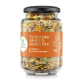 Close-up of the Turmeric Spiced Herb Tea label, showcasing ingredients like turmeric, black pepper, and bergamot extracts.