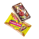 Smart Yums Protein Bites packaging and bar featuring peanut butter, almonds, seeds, and cranberries, offering a high-protein, gluten-free snack.