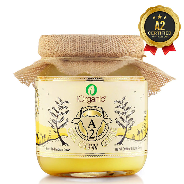 Jar of iOrganic A2 Gir Cow Ghee, A2 certified for purity, draped with a burlap cloth to emphasize its natural and traditional Ayurvedic origins. Bilona Ghee