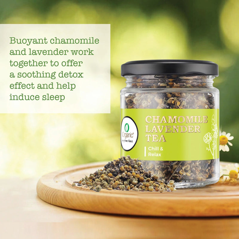 Chamomile Lavender Tea jar on a wooden plate with chamomile flowers, emphasizing its soothing and detox benefits.