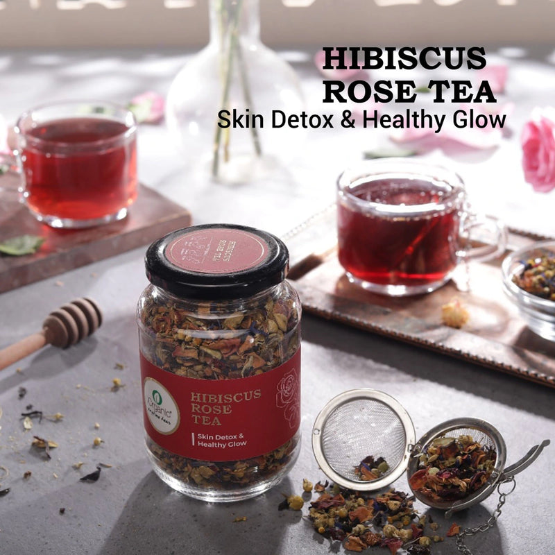 Aesthetic setup of Hibiscus Rose Tea with loose tea leaves and a brewing infuser, promoting skin detox and hydration.