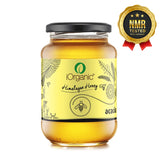 Sealed jar of iOrganic Raw Acacia Honey, NMR tested for purity, ready for consumption, promoting the honey’s all-natural, unprocessed qualities.