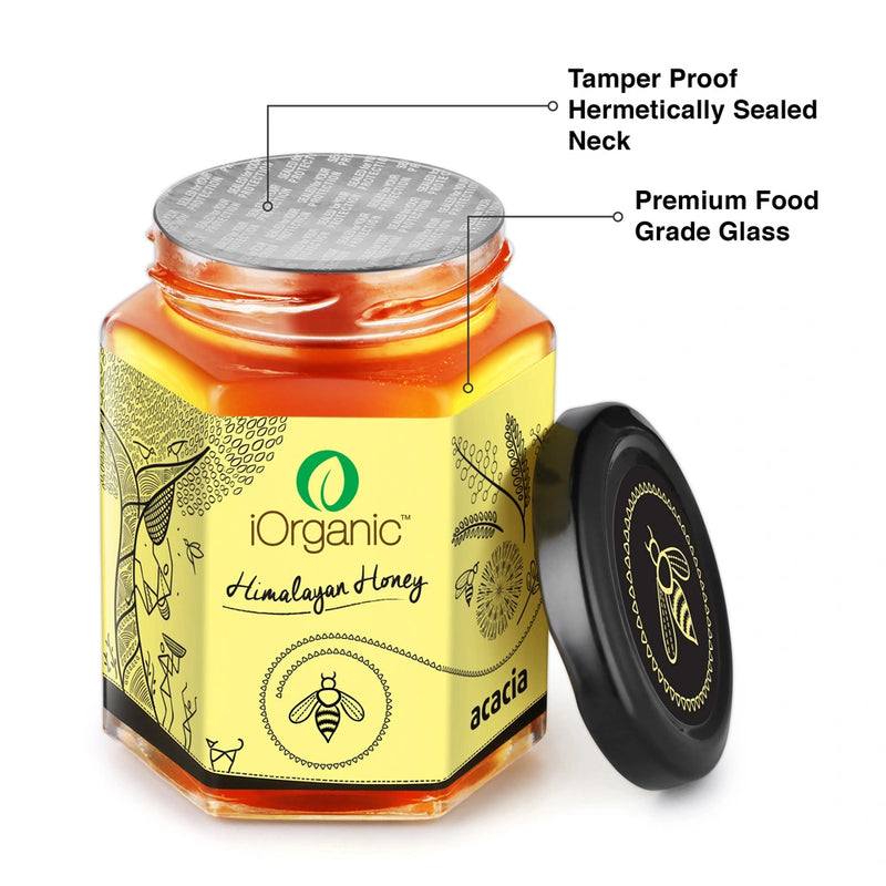 Close-up of iOrganic Raw Acacia Honey jar with a tamper-proof safety seal.