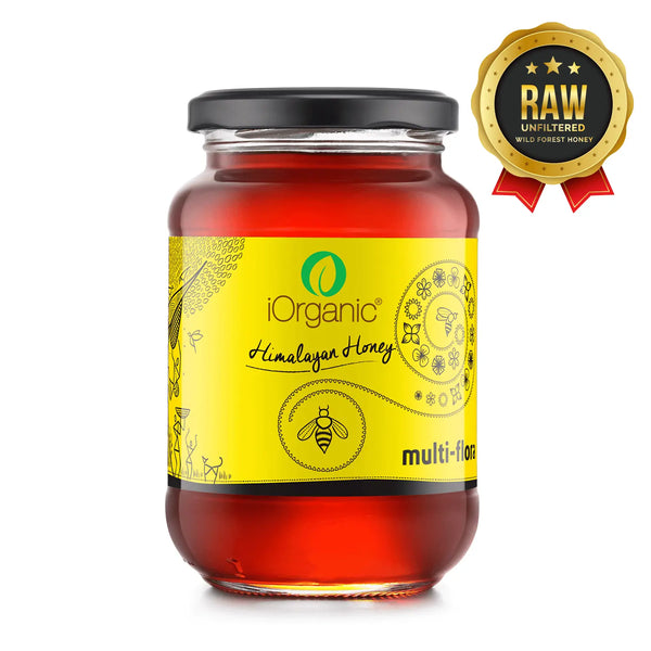 Sealed jar of iOrganic Raw Himalayan Honey adorned with a 'RAW Unfiltered' seal, showcasing the rich, pure honey's multi-floral origin, ideal for organic raw honey seekers.