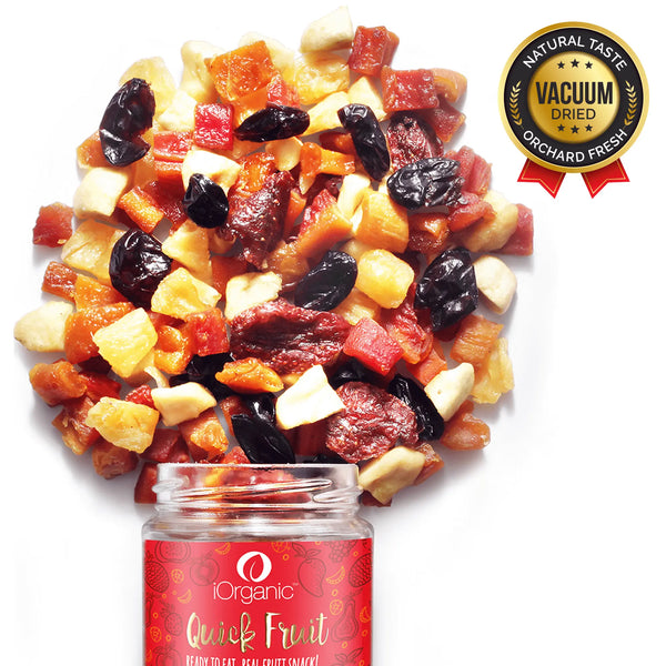 Overflowing jar of iOrganic’s Tropical Dried Fruit Mix, rich in natural taste and vacuum dried for orchard freshness, a perfect dried fruit snack.