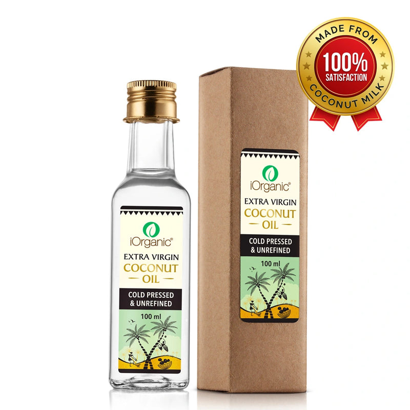 iOrganic Virgin Coconut Oil in a sleek 100ml glass bottle, accompanied by its eco-friendly brown packaging. The label highlights "Cold Pressed & Unrefined," ensuring purity and natural goodness. A golden badge on the box signifies "100% Satisfaction - Made from Coconut Milk," emphasizing premium quality.