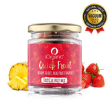 iOrganic Tropical Dried Fruit Mix jar accompanied by fresh pineapple and strawberries, presenting a natural and vacuum-dried snack option